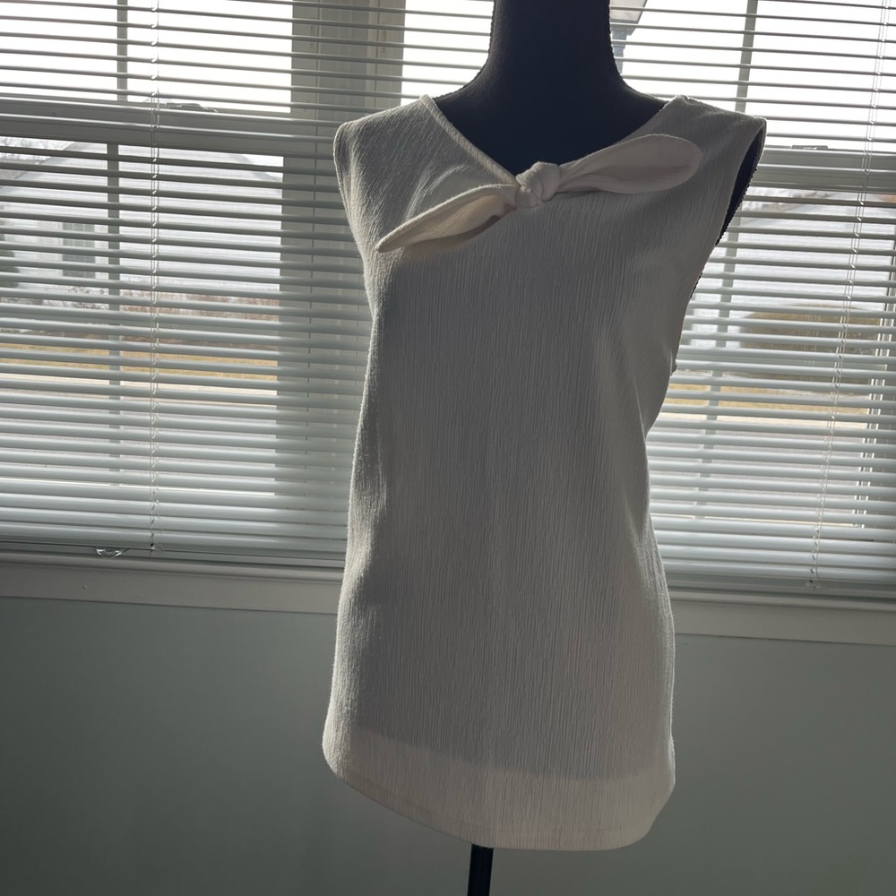 Elegant Soft cream Sleeveless Top with diagonal bow